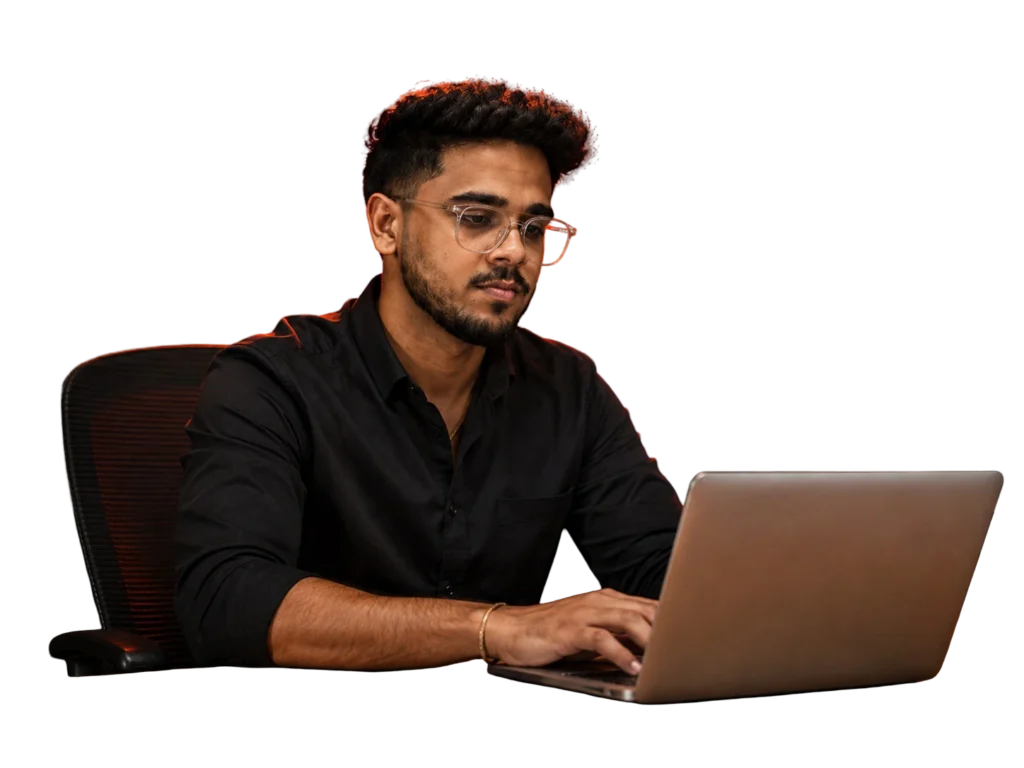 best freelance digital marketer in Kottayam working on a laptop, focused on digital marketing and online business growth.